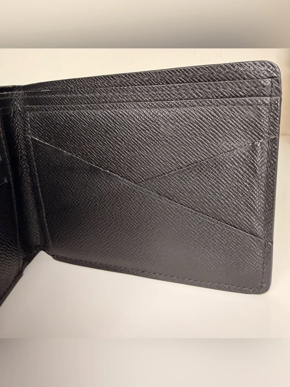 Authentic Louis Vuitton Black Epi Leather Bi-Fold Wallet
